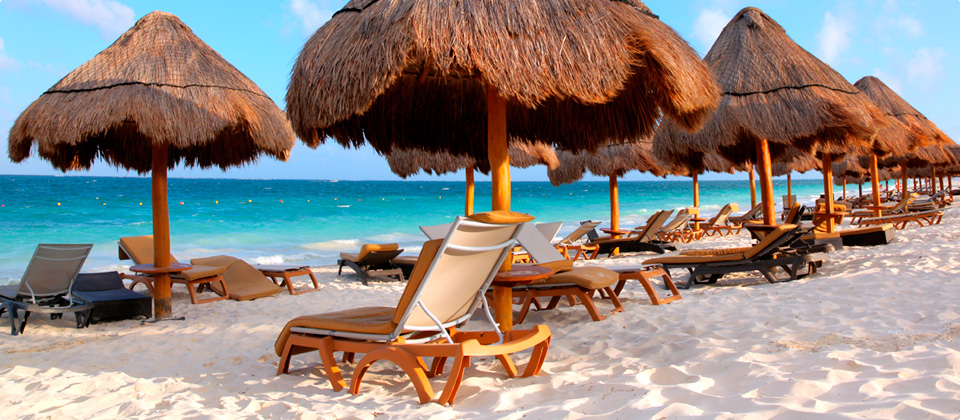 Lounge chairs on the beach.