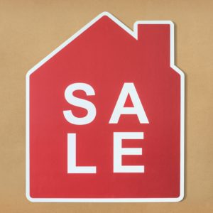red sale house sign
