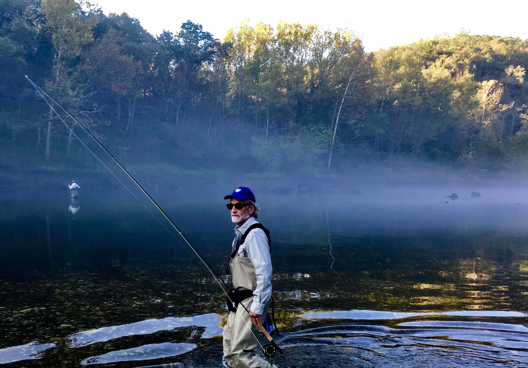 man walking in water