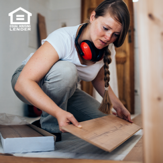 Woman putting in wood floors