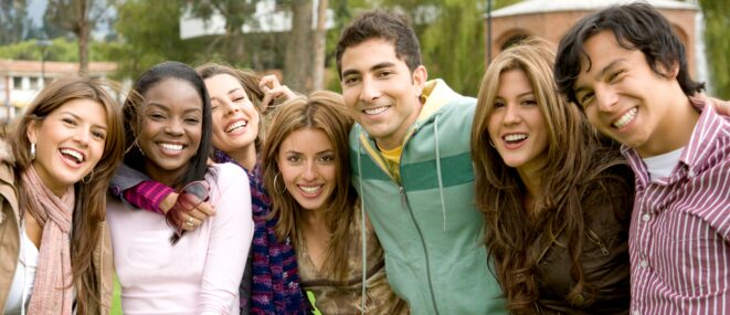 Group of teenagers smiling at the camera